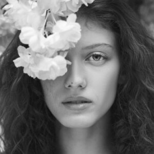 Woman Posing with Flowers